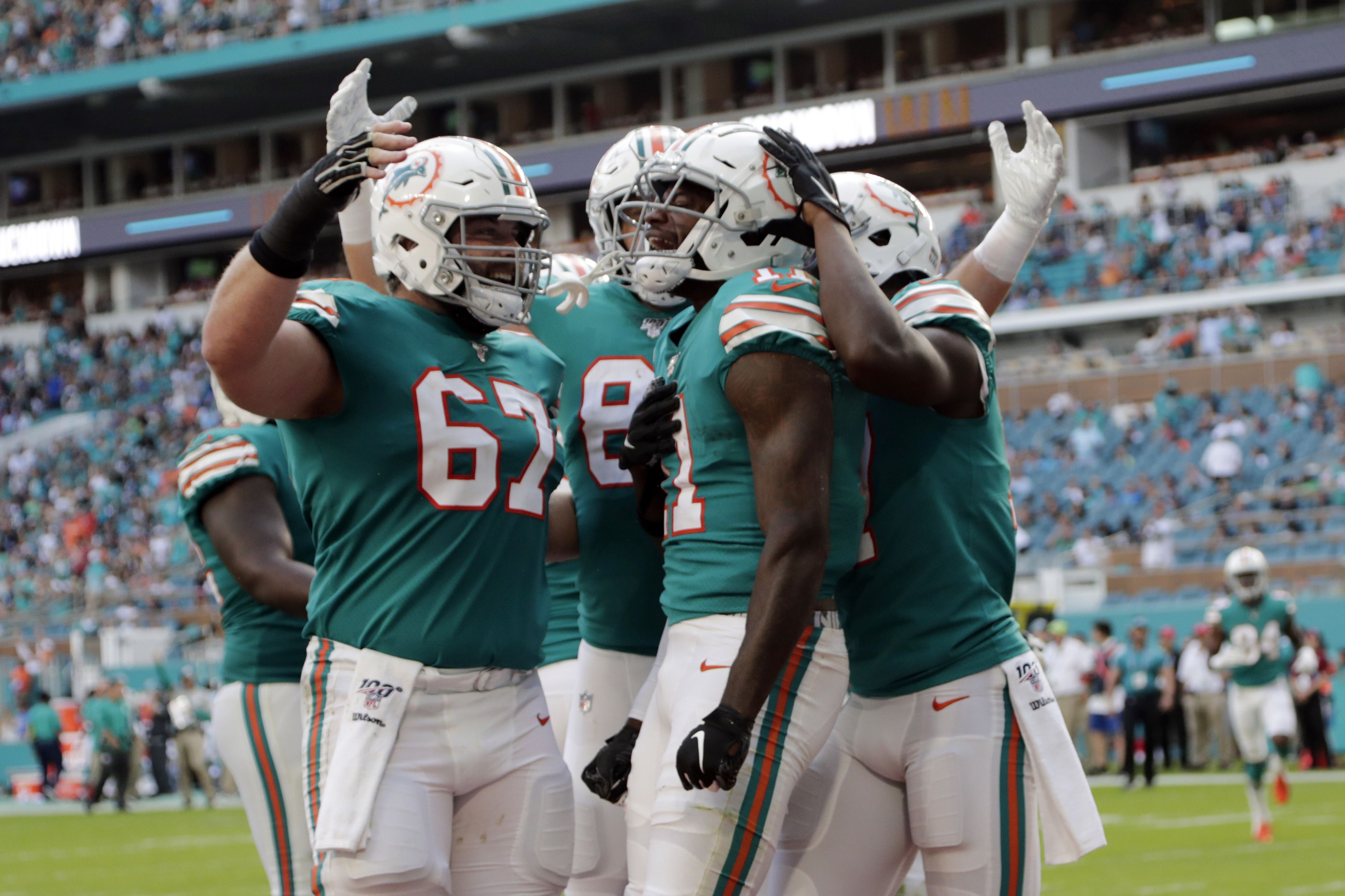 Dolphins punter throws touchdown pass to kicker Jason Sanders in trick play  of the season 