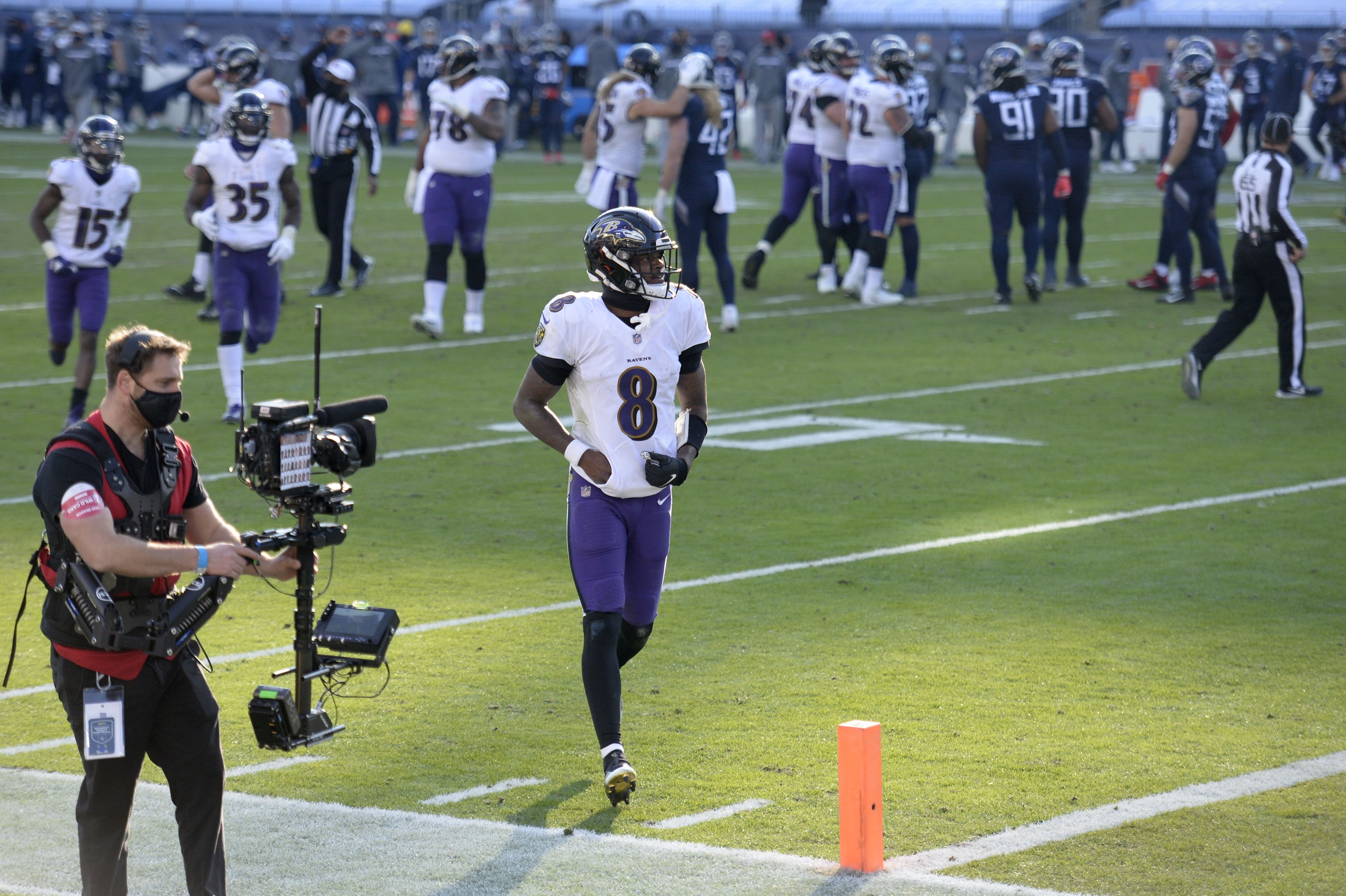 Ravens celebrate on Titans logo, get flagged for taunting after