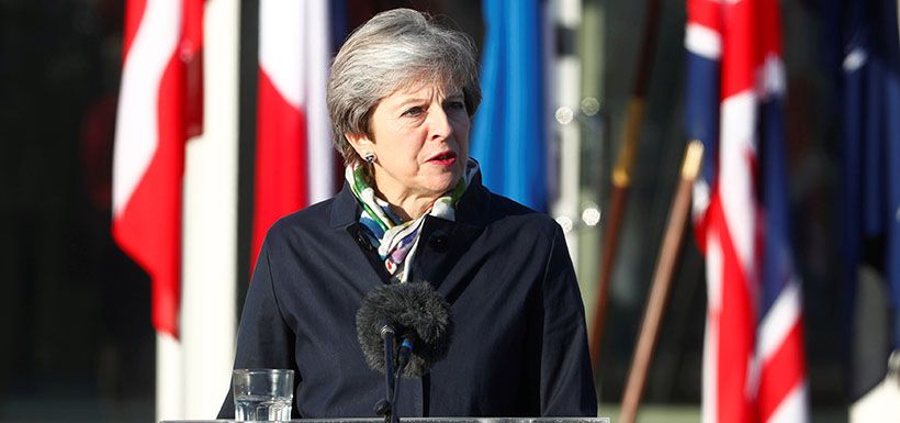 Britain's Prime Minister May makes a statement as she visits NATO Enhanced Forward Presence (EFP) battalion battle group in Tapa