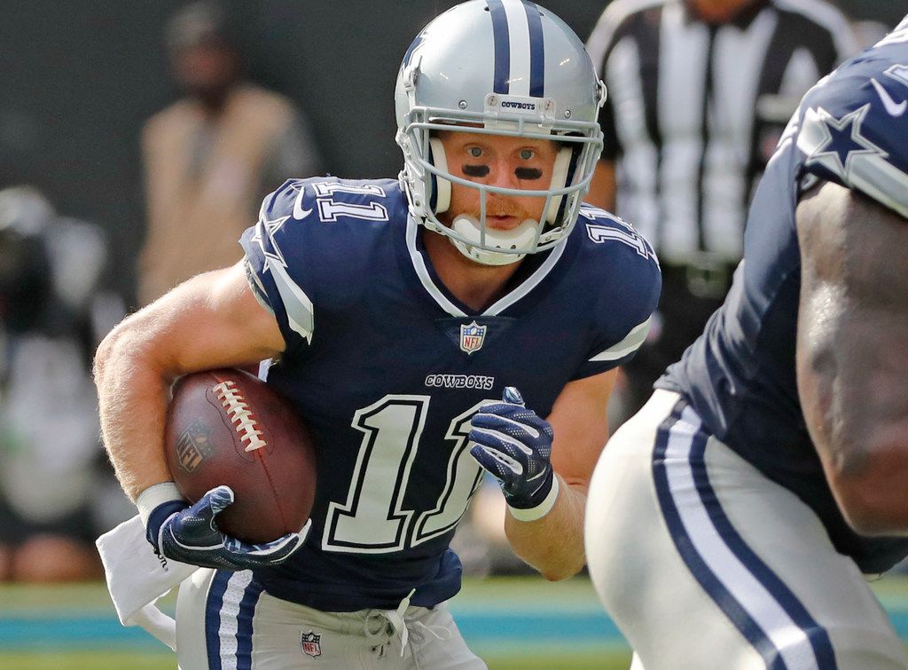 Buffalo Bills wide receiver Cole Beasley (10) reaches the end zone for a  touchdown after catching a pass as Dallas Cowboys cornerback Byron Jones  (31) looks on in the first half of