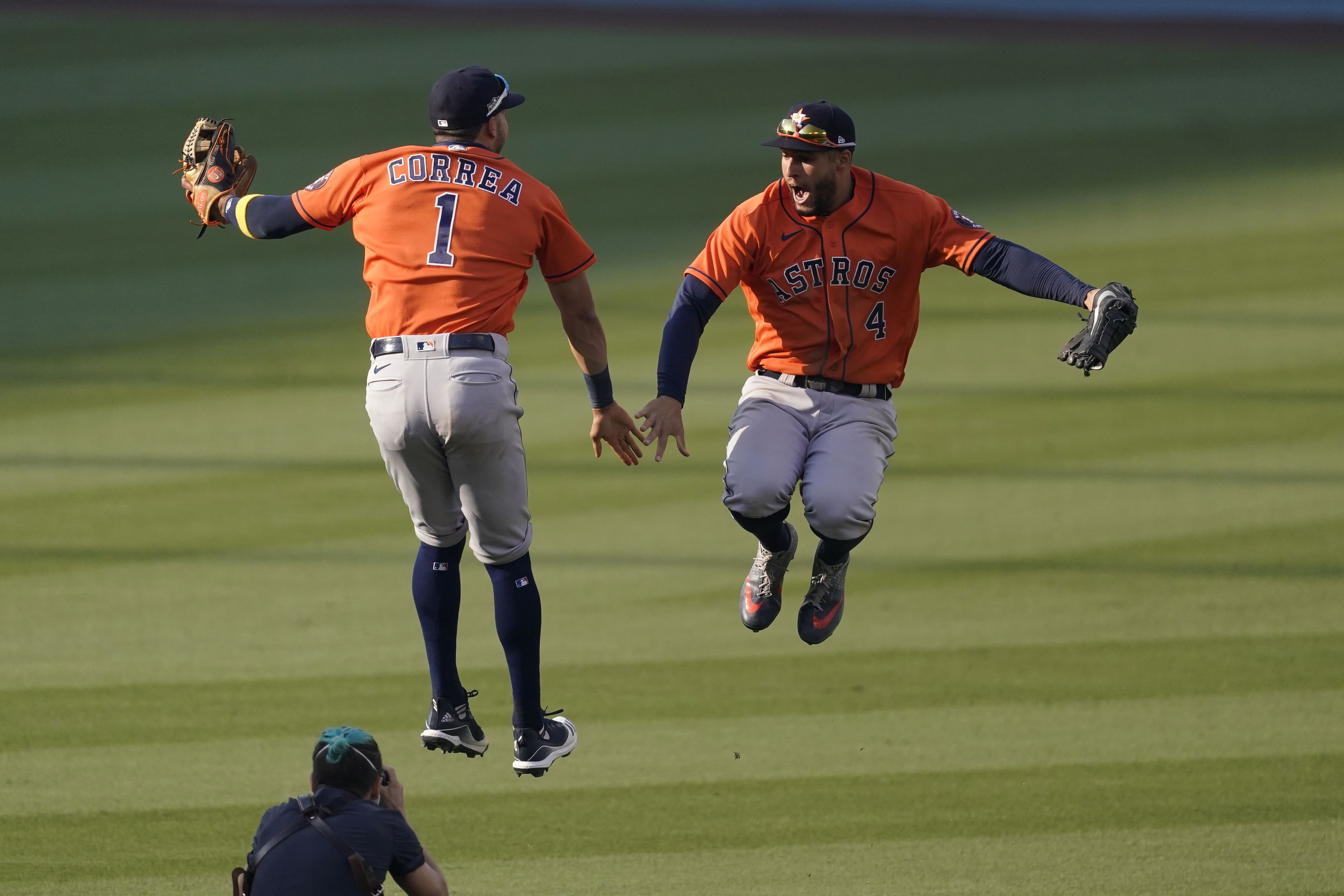 Oakland Athletics' Mike Fiers, center, celebrates with Matt Olson