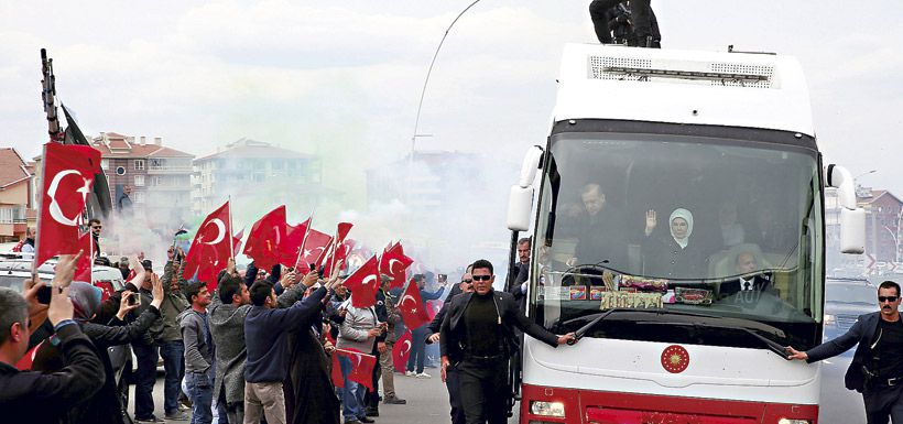 turkish-president-erdogan-is-greeted-by-his-37380079