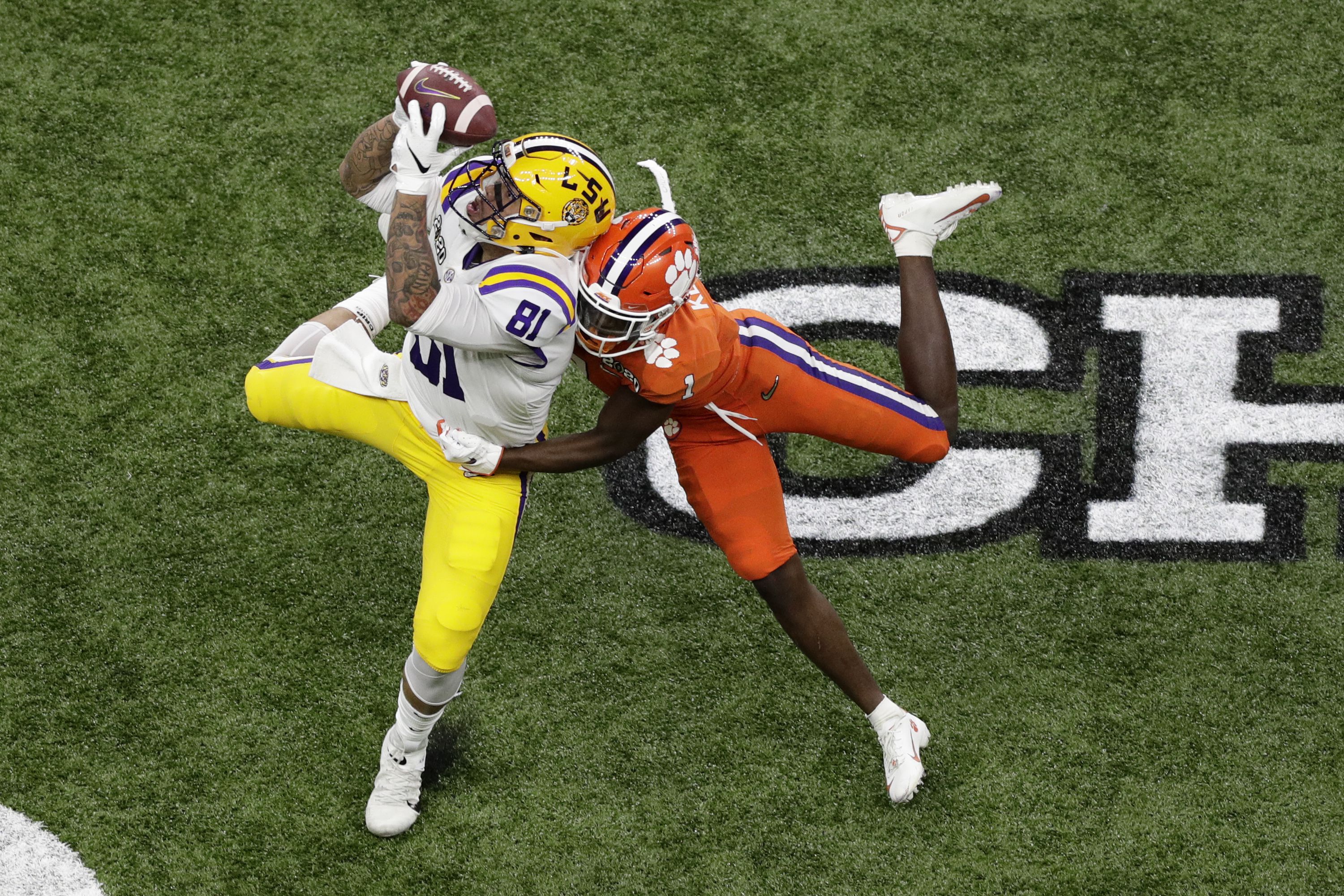 LSU caps a magical season by beating Clemson 42-25 for the title