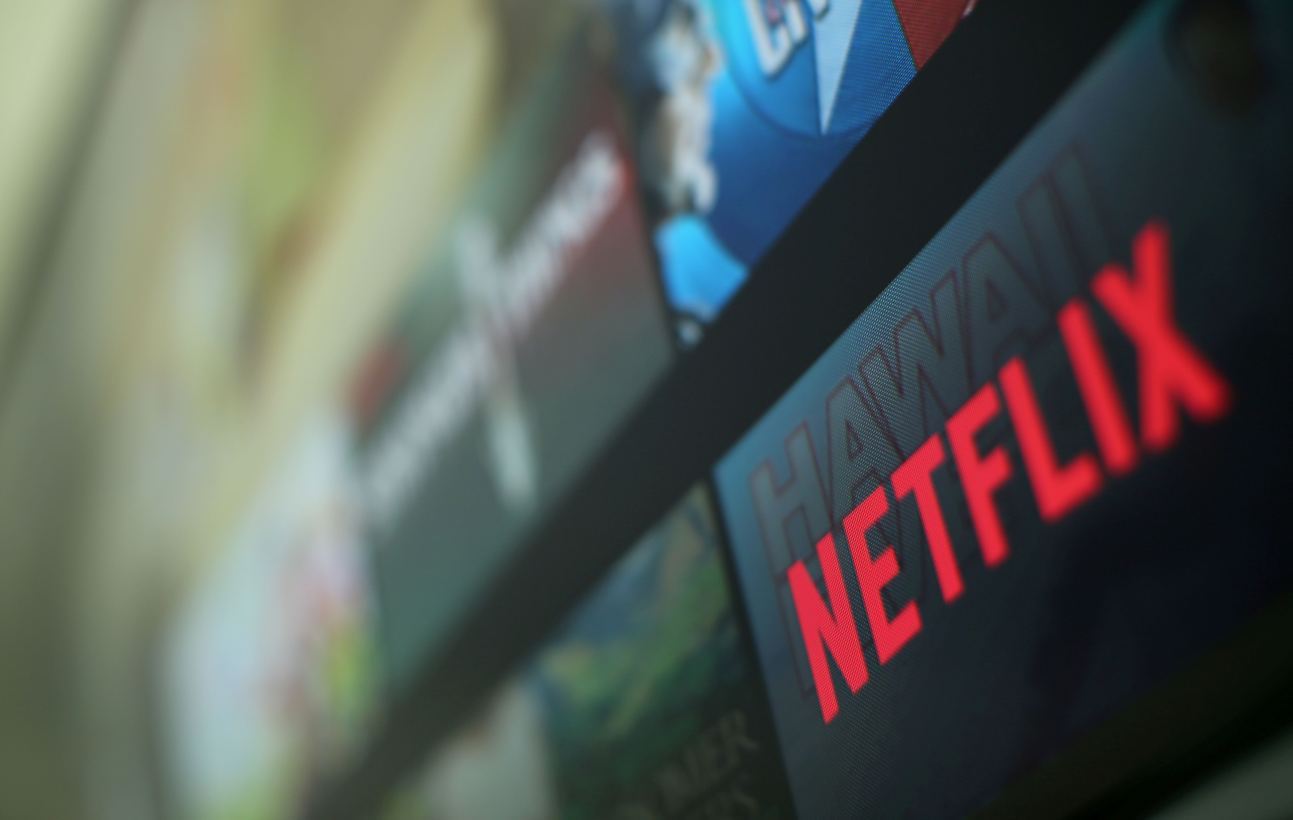 FILE PHOTO: The Netflix logo is pictured on a television in this illustration photograph taken in Encinitas California