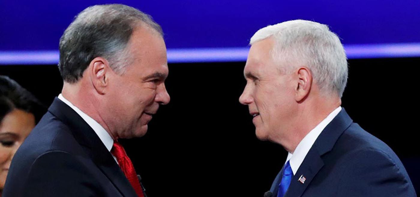 Democratic U.S. vice presidential nominee Senator Tim Kaine and Republican U.S. vice presidential nominee Governor Mike Pence shake hands as they arrive for their vice presidential debate at Longwood University in Farmville