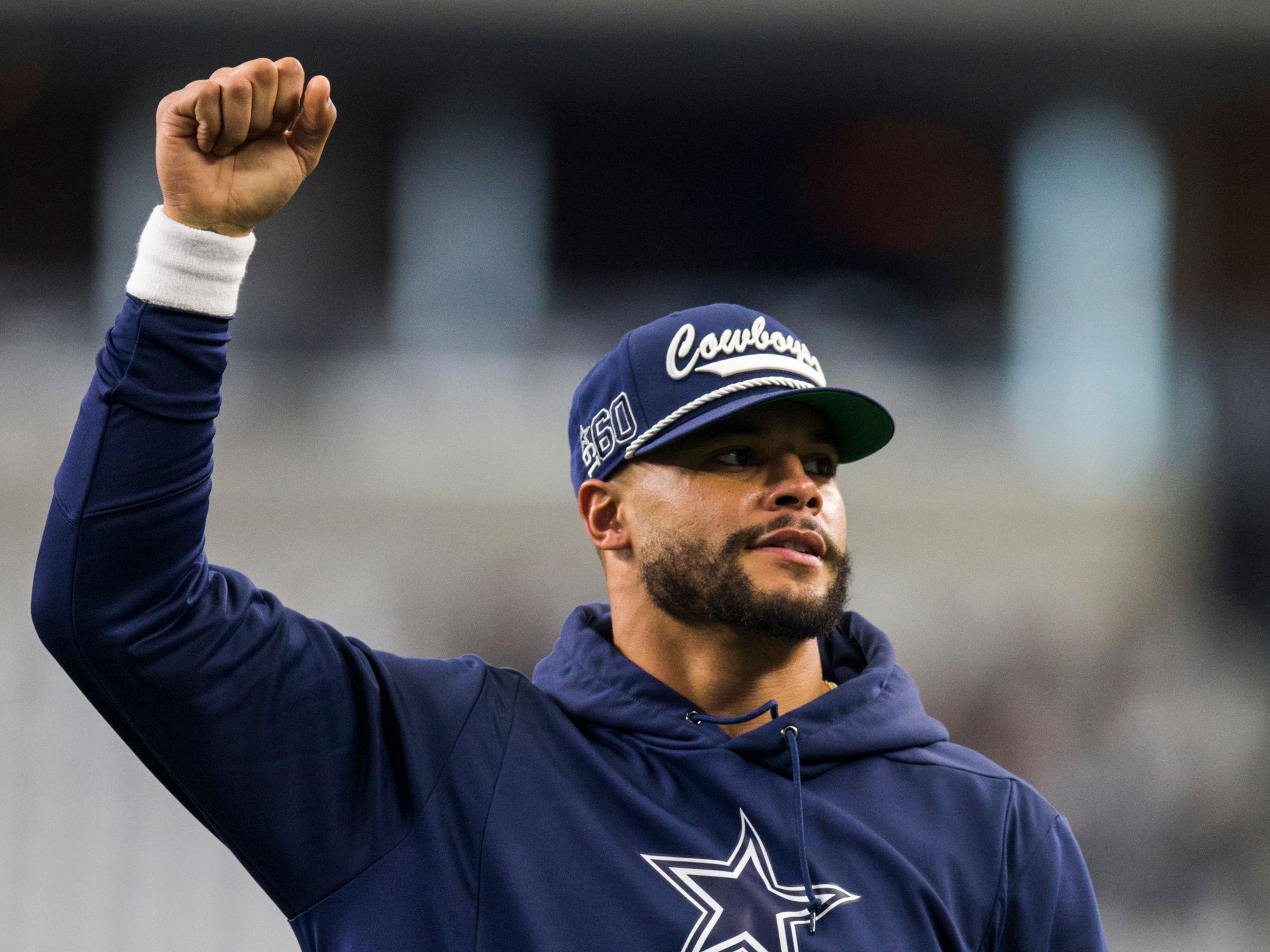 CowBuzz: Dak Tips His Cowboy Hat After Signing