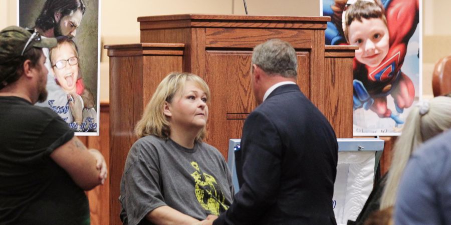 Rebecca Hunnicutt  aunt of Jacob Hall -- a 6-year-old South Carolina boy wounded in a schoolyard shooting who died October 1 -- listens to U.S. Senator Jeff Duncan during a wake service in Townville