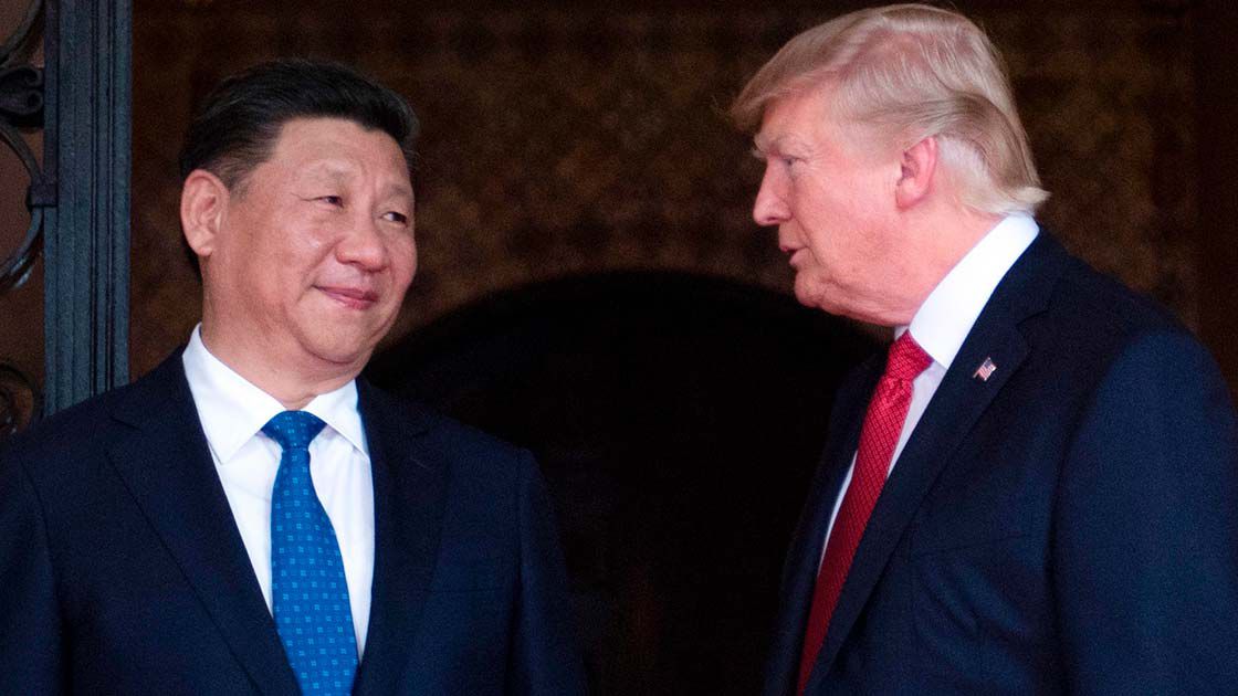 Donald Trump junto al líder chino Xi Jinping