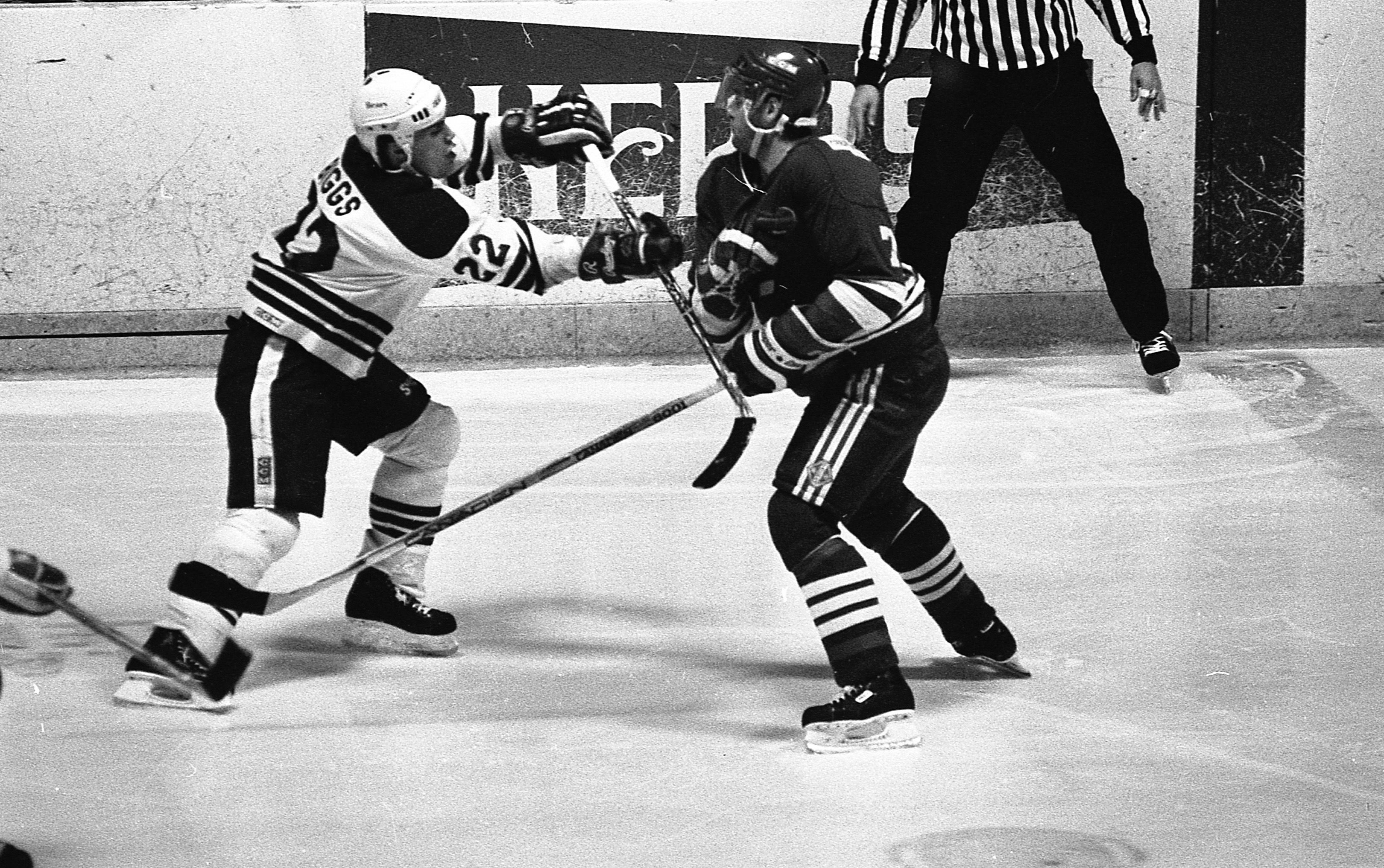 Mike Emrick shows off Hershey Bears jersey during national telecast