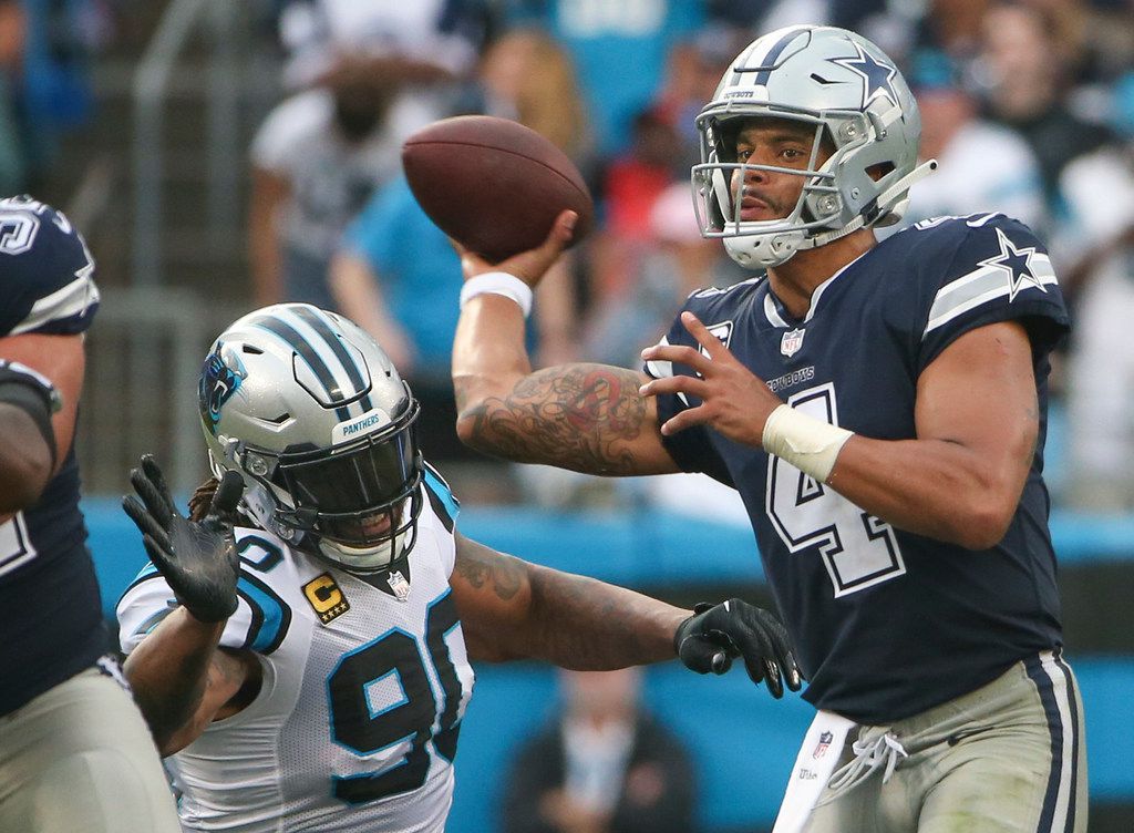 Elliott, Cowboys run over top defense, beat Panthers 36-28