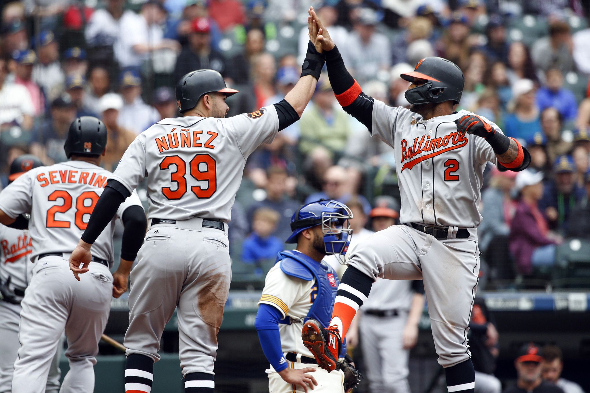 Orioles 'Turn Back the Clock' to beat Mariners, 8-4, and end season