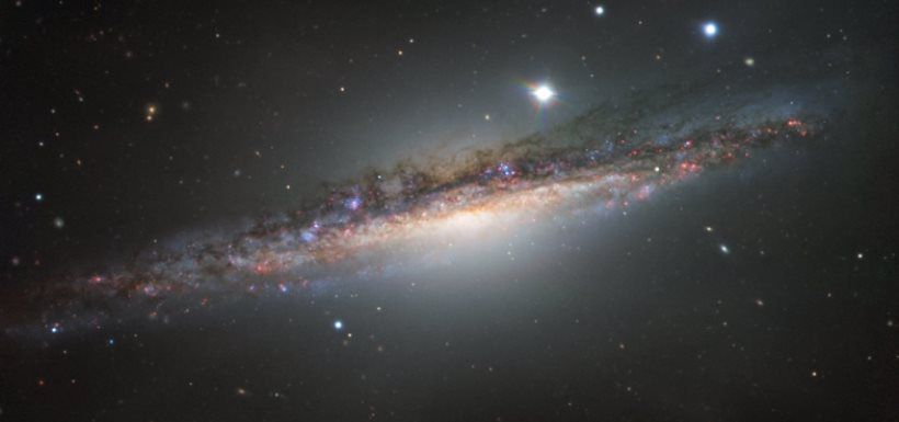 The edge-on galaxy NGC 1055