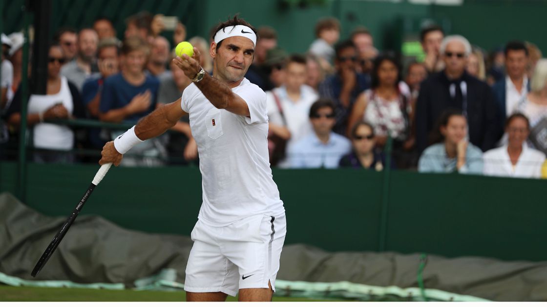 Switzerland's Roger Federer plays a shot as he attends a practice ses