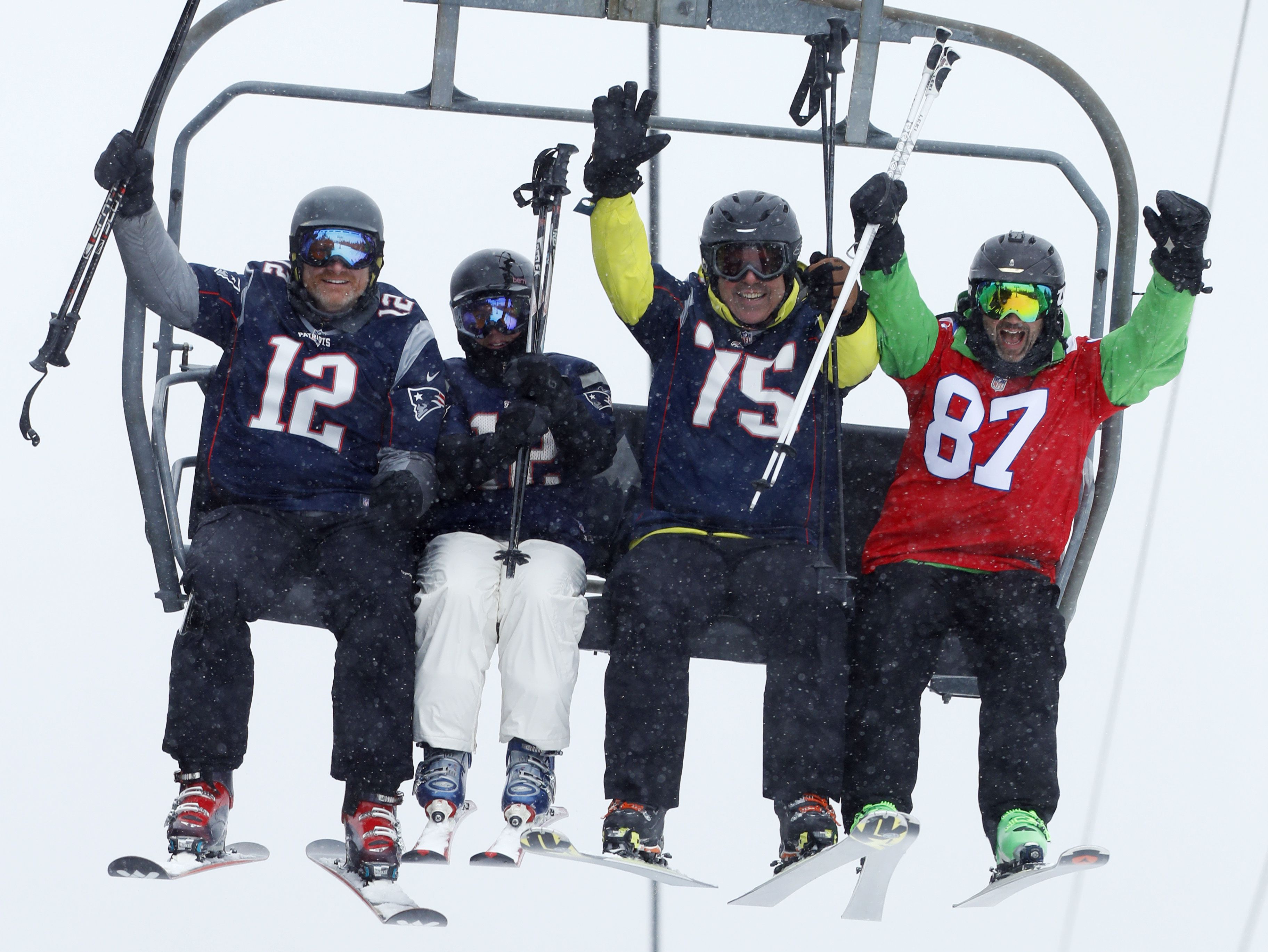 Fans of the New England Patriots NFL football team ski en masse at the  Sugarloaf ski resort, Sunday, Feb. 3, 2019, in Carrabassett Valley, Maine.  About 200 skiers took part to show