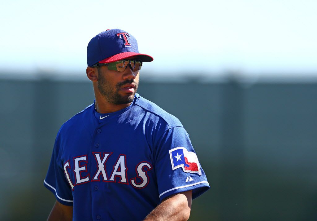 Seahawks' Russell Wilson takes infield practice with Texas Rangers (Video)