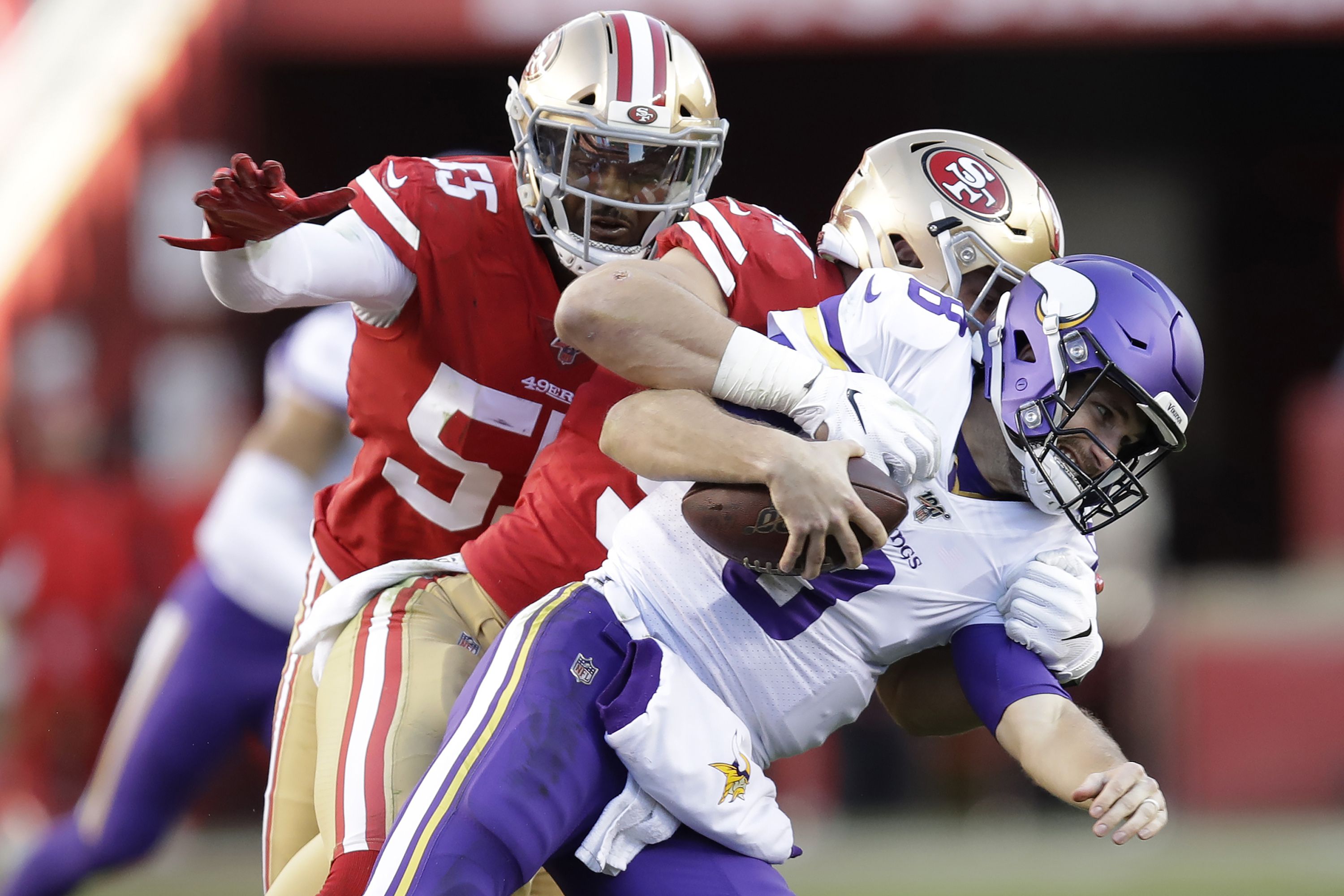 San Francisco 49ers defensive end Nick Bosa (97) and teammate Dee