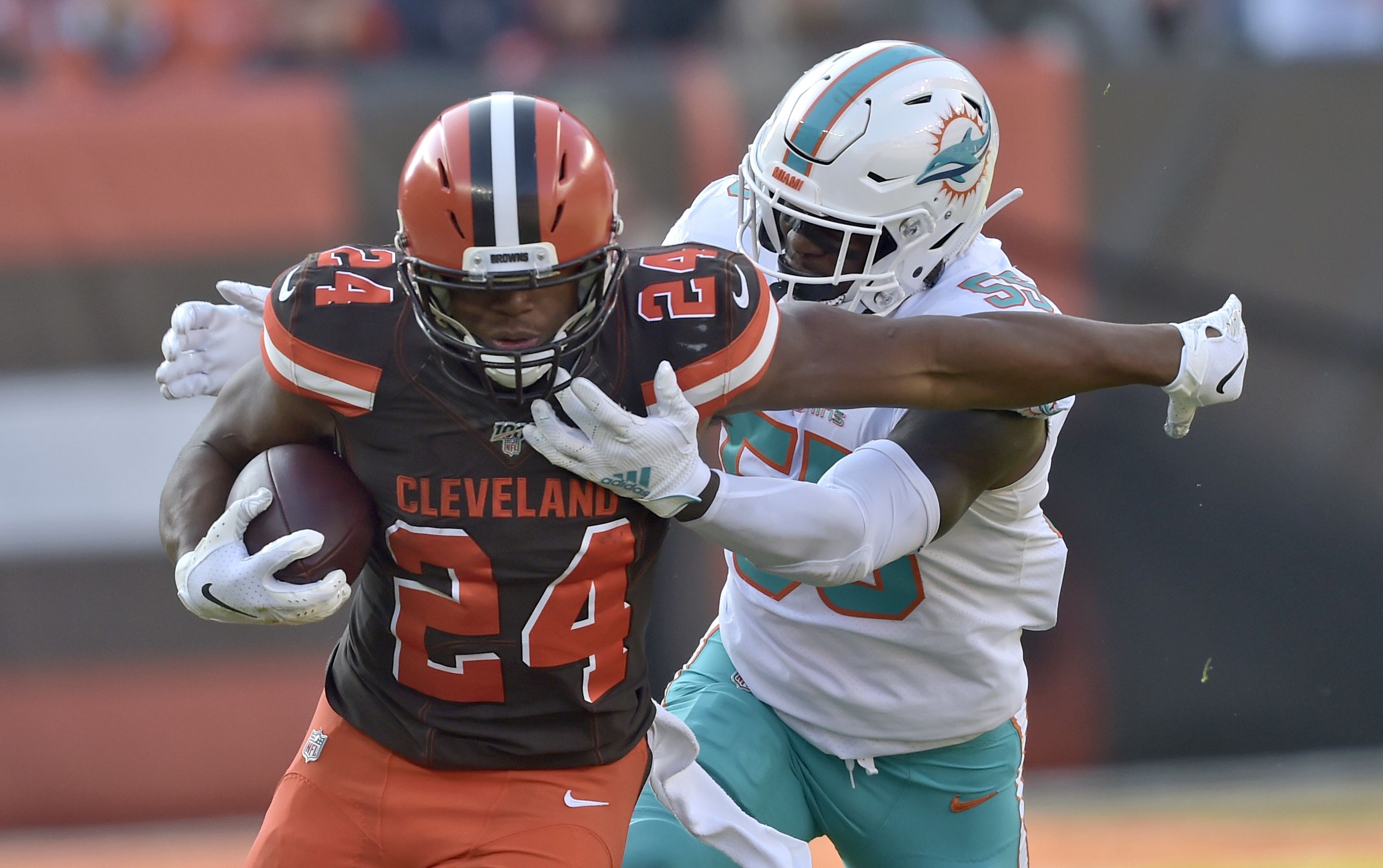 Cleveland Browns defensive end Myles Garrett (95) pulls the helmet off  Pittsburgh Steelers quarterback Mason Rudolph (2) in the fourth quarter of  an NFL football game, Thursday, Nov. 14, 2019, in Cleveland.