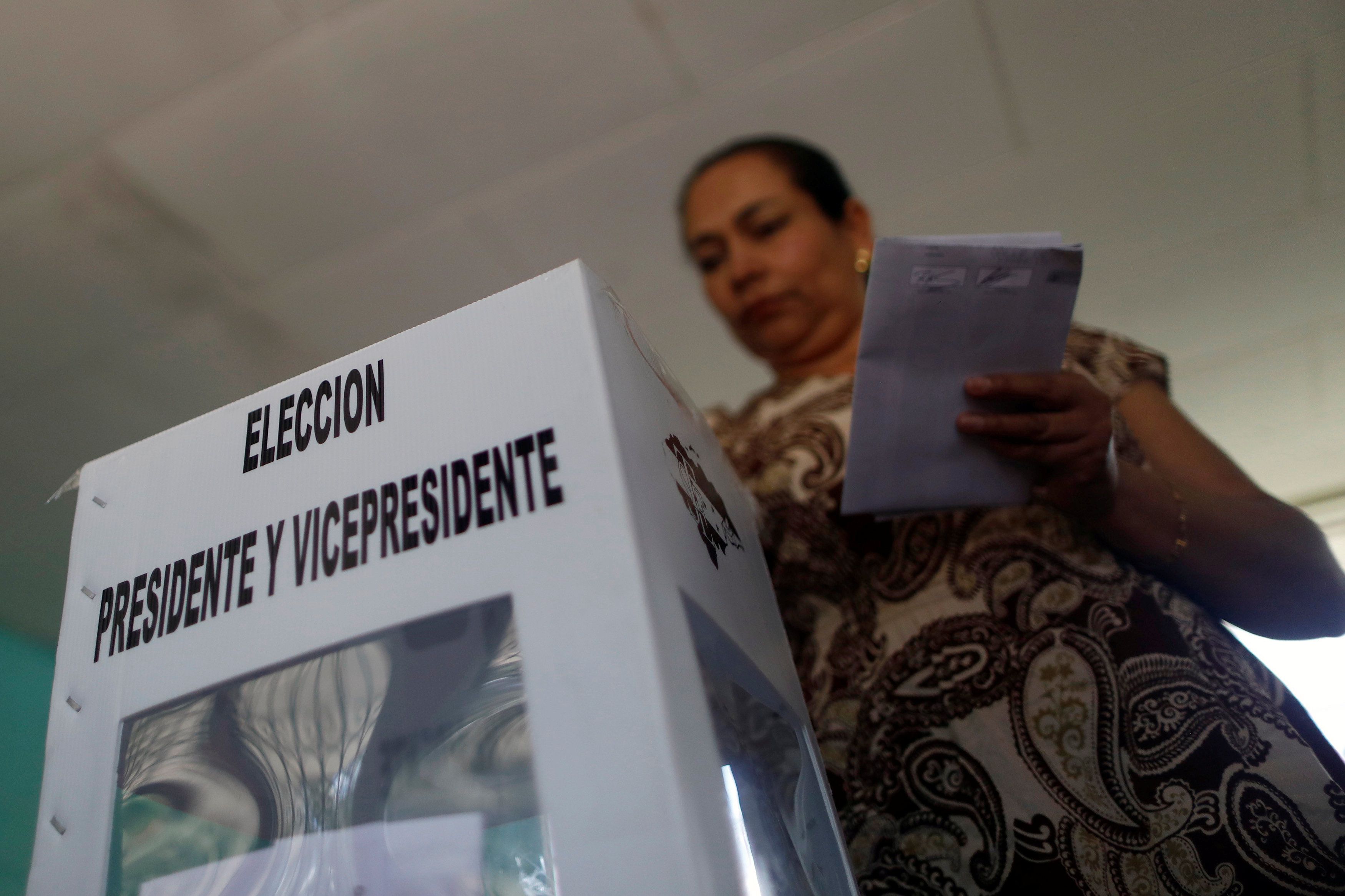 Woman casts her ballot in the presidential election in Tegucigalpa