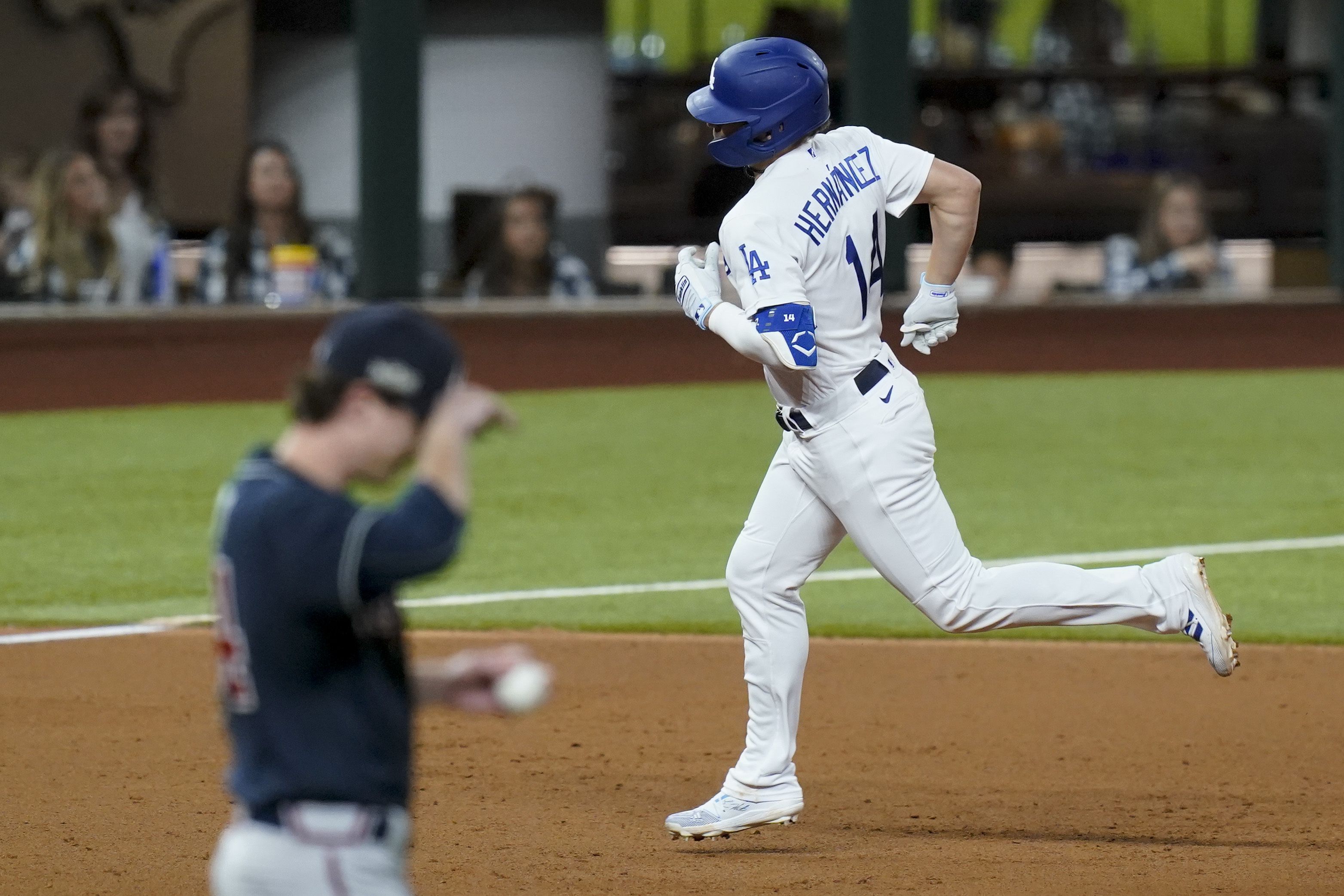 Los Angeles Dodgers starting pitcher Victor Gonzalez celebrates striking  out Atlanta Braves' Charlie Culberson with the bases loaded during the  eighth inning in Game 1 of a baseball National League Championship Series