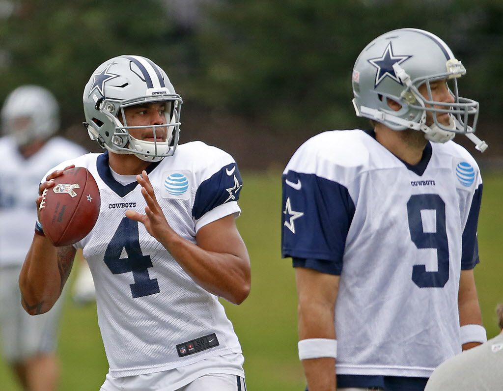 Dallas Cowboys quarterback Tony Romo (9) puts his hand to his face