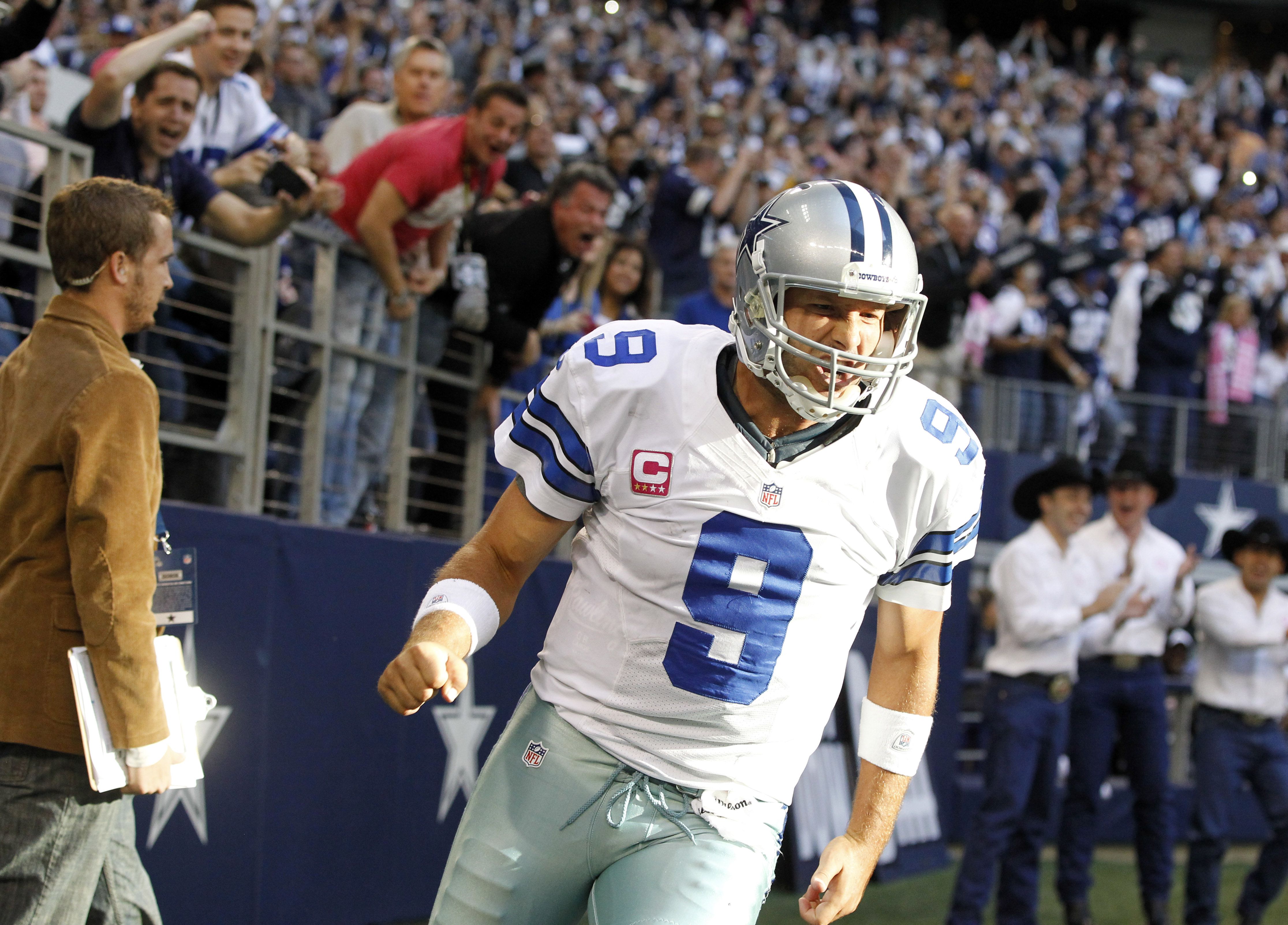 Cowboys, Tony Romo agree to six-year, $108 million deal