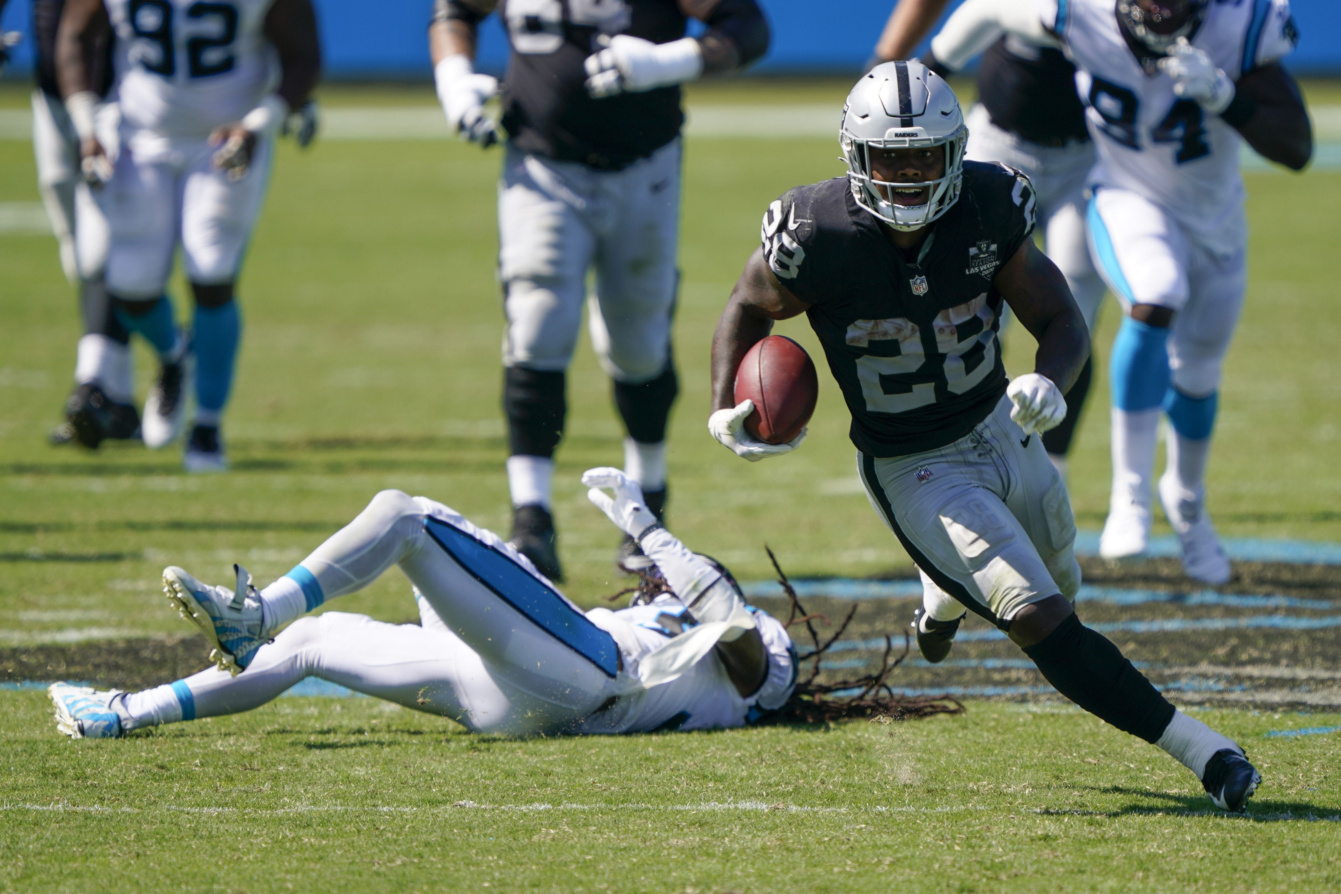 Josh Jacobs runs for three TDs as Raiders hold off Panthers