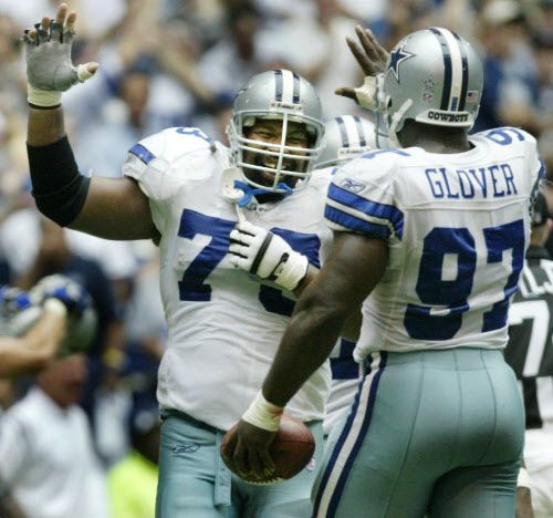 Former Dallas Cowboys players, from left, Michael Irvin, Troy Aikman and Emmitt  Smith were inducted into the Cowboy's Ring of Honor at Texas Stadium during  halftime of the Dallas-Washington game September 19