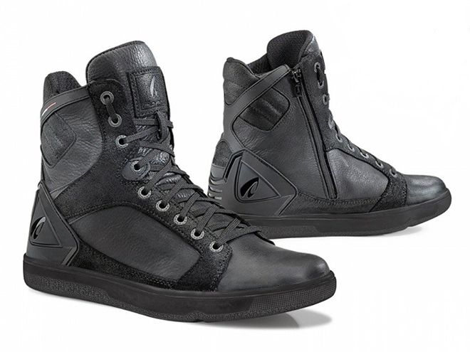 What type of shoes should be worn when riding motorcycles and in