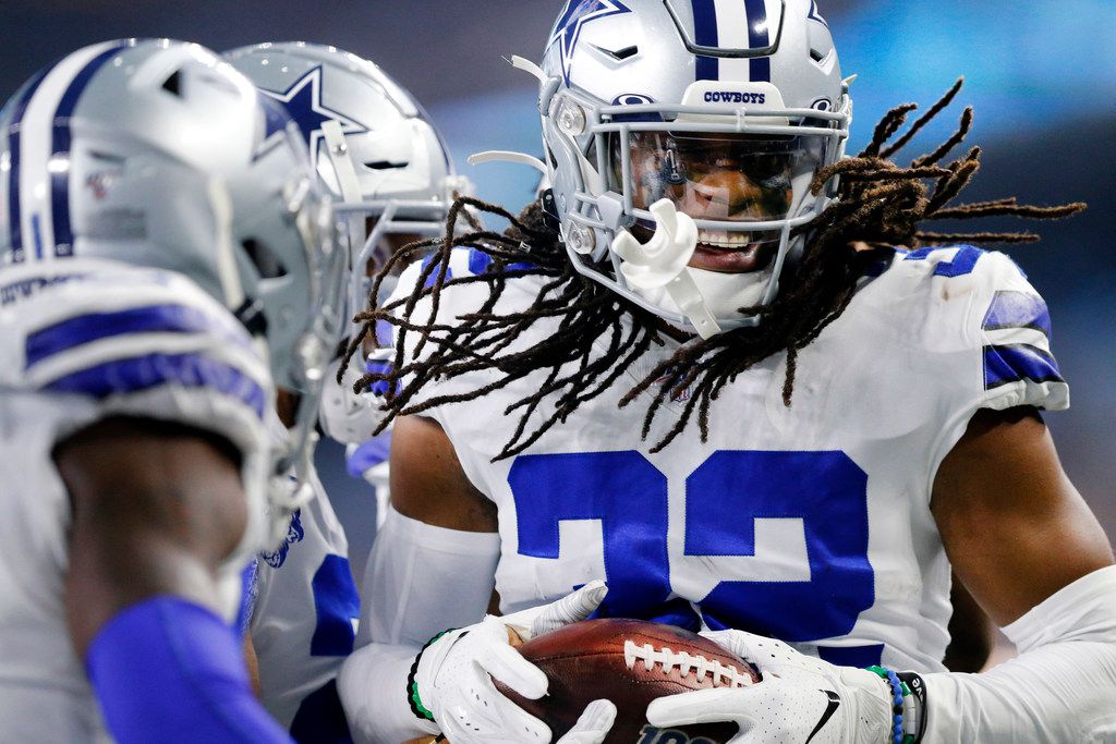 Aug 29, 2019: Dallas Cowboys cornerback Donovan Olumba #32 carries the ball  back for a touchdown after making an interception in the first quarter  during an NFL preseason game between the Tampa