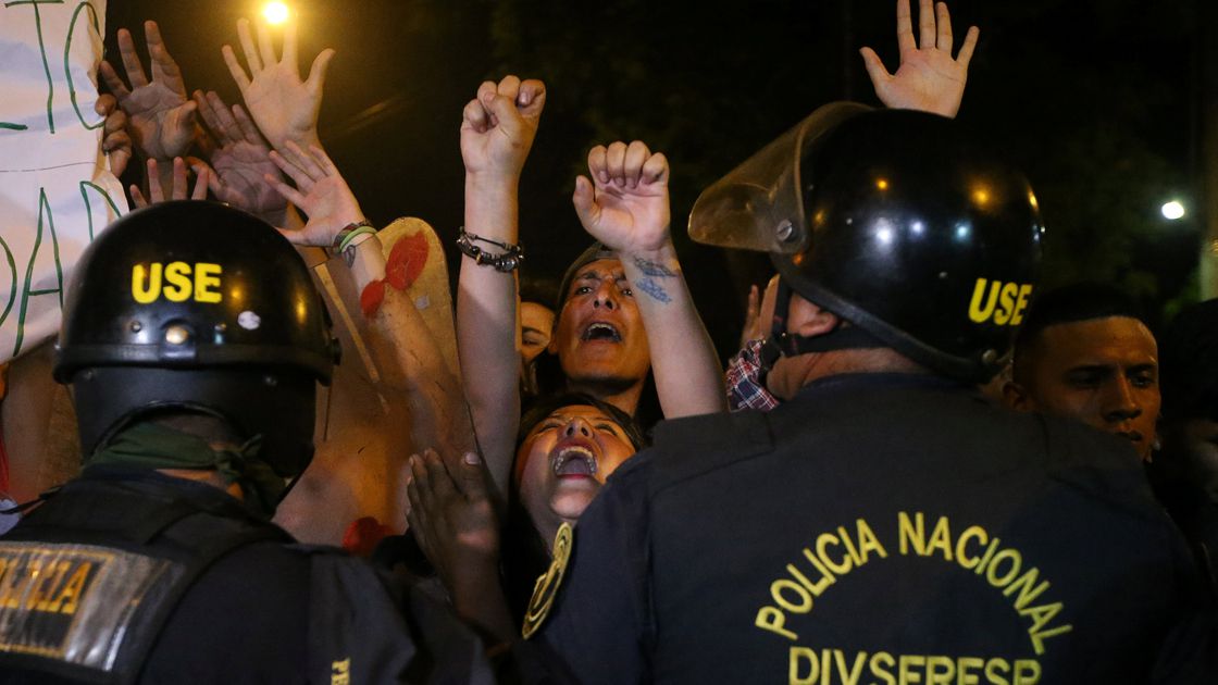 Protesters march near Centerio hospital after Peruvian President Pedro Pablo Kuczynski pardoned former President Alberto Fujimori in Lima