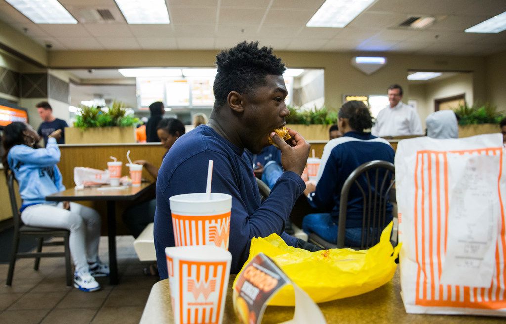 Texas Whataburger employees deliver food to H-E-B employees