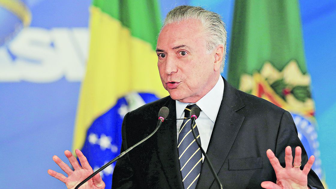 Brazil's President Michel Temer gestures during a ceremony to launch the Digital Platform of the Emprega Brasil Program, at the Planalto Palace in Brasilia