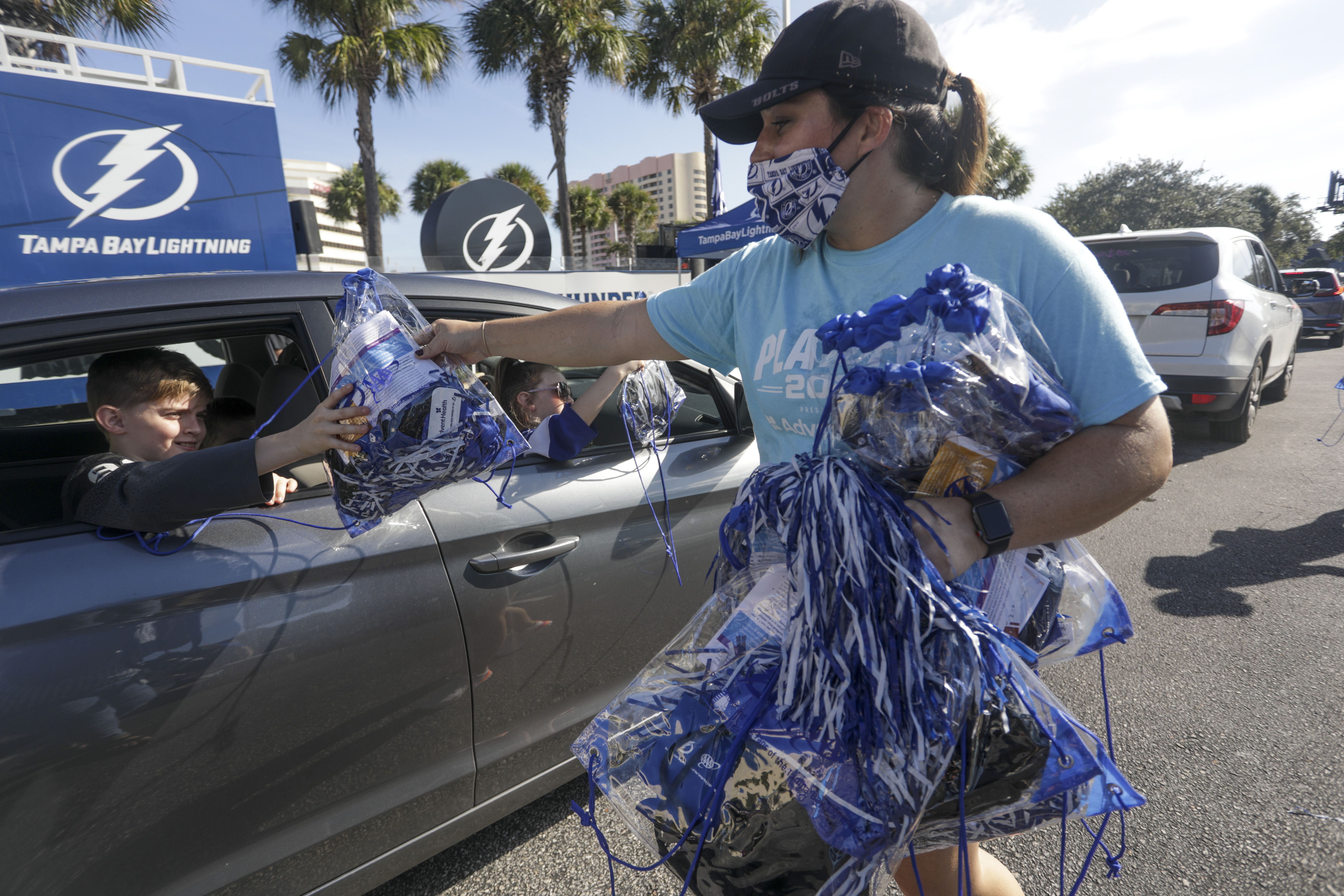 Tampa Bay Lightning drive-thru swag pep rally Saturday in Tampa